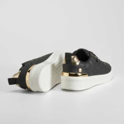 Outlet Deportiva casual acolchada negra Mujer Sneakers